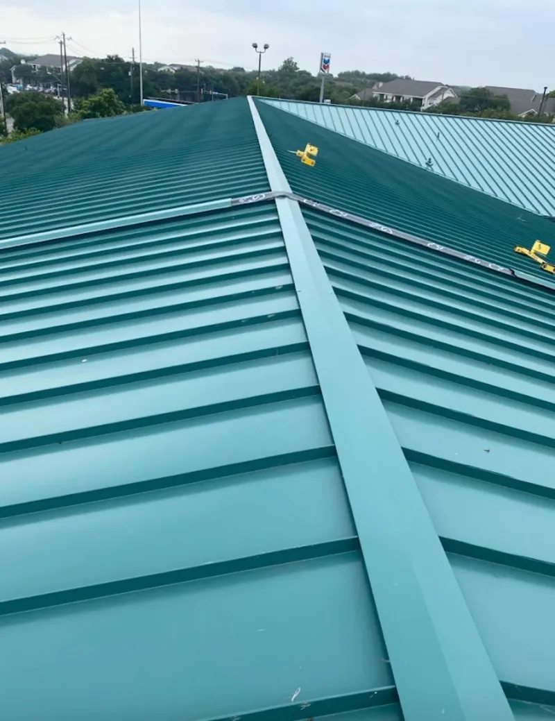 Green commercial metal roof ridge and valley for Metal Roof Repair in Gun Plain